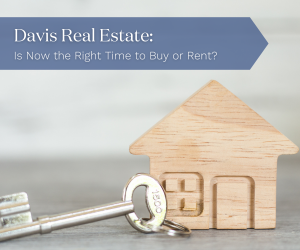 Davis Real Estate: Is Now the Right Time to Buy or Rent? Photo of house carved from a wood block and a key.